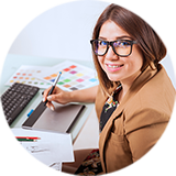 A woman sitting at a desk.