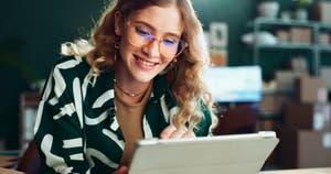 Female entrepreneur adding PayPal Pay Later as an option to her online store