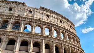 Photograph of the The Roman Colosseum photographed at an angle from below