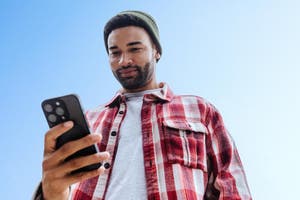 A millennial views an ad on their phone.