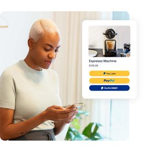 A woman shopping on her mobile phone, a tile showing an espresso machine at checkout with its price and the buy button