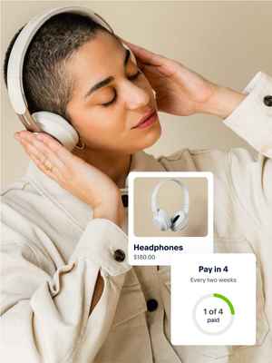 A person listening to music on headphones. Next to the photo is an in-app example showing the Pay in 4 option.