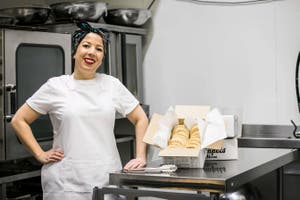 Picture of Merna, owner of Crumpets by Merna, in the kitchen of her business