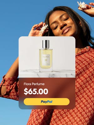 Person getting sunshine outside while holding flower petals to the sky with overlay of floral perfum for $65 with PayPal button