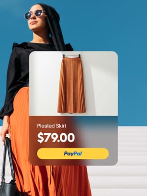 Person standing outside with overlay of pleated skirt product price $79 with PayPal button