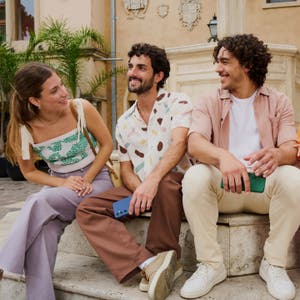 UI of phone of friends smiling outside