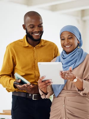 Photos depicting merchants in various industries carrying out day-to-day tasks to support their businesses with an overlay of charts depicting current versus past customers over time and an invoice sent alert
