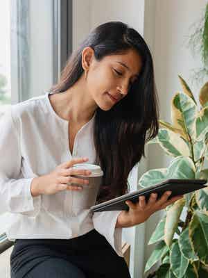 Photos depicting merchants in various industries carrying out day-to-day tasks to support their businesses with an overlay of charts depicting current versus past customers over time and an invoice sent alert