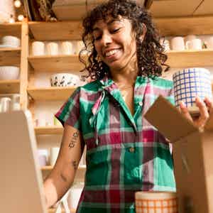 Photos depicting merchants in various industries carrying out day-to-day tasks to support their businesses