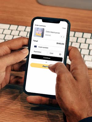 Phone screen during PayPal checkout showing the different methods of payment