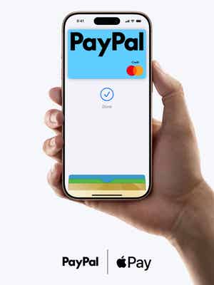 Hand holding a phone showing the PayPal Credit Card on a Apple Pay screen