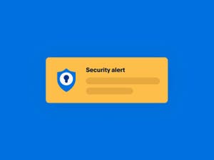 Orange rectangle with text reading 'Security alert', icon of a blue shield with a white keyhole in its centre