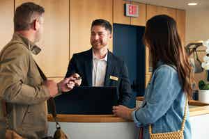 Guests checking into a hotel