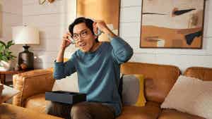 Man trying on headphones