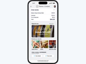 Image of man typing on laptop.