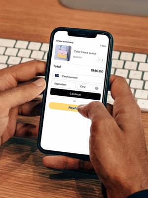 Phone screen during PayPal checkout showing the different methods of payment