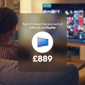 Man watching TV with Pay in 3 UI overlay