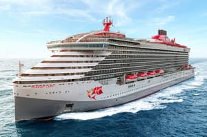 Virgin Voyages Scarlet Lady cruise ship sailing on the ocean.