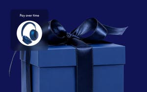 Gift box with a 'Pay over time' offer for wireless headphones.