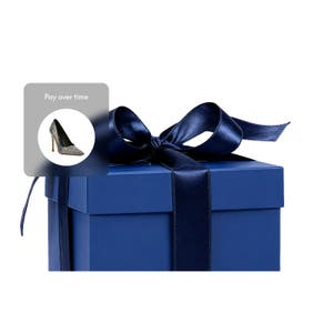 Navy blue gift box with a satin ribbon bow, featuring a "Pay over time" PayPal Pay Later callout with a studded stiletto heel shoe.