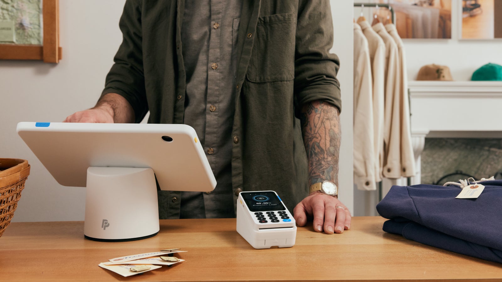 Image of PayPal reader in shop environment